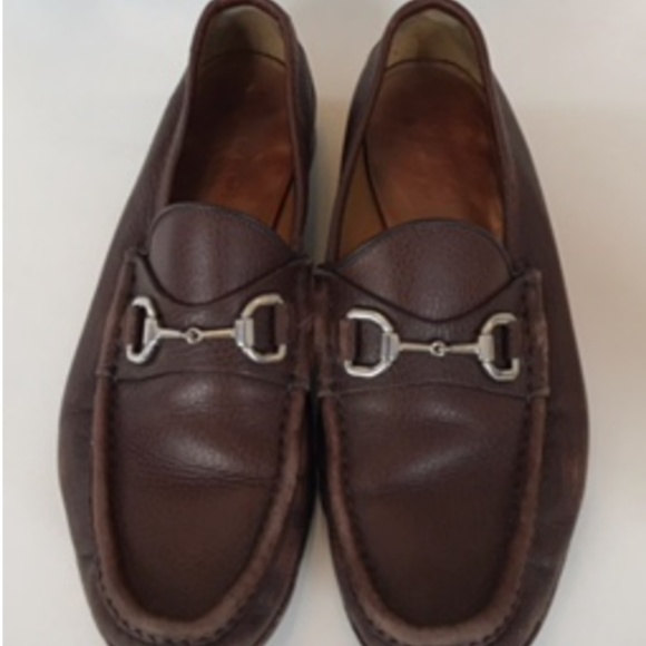 Brown Gucci horse-bit loafers